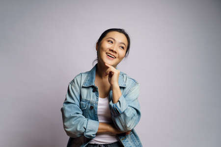 Asian woman happy confident looking at camera, isolated on white background.の写真素材