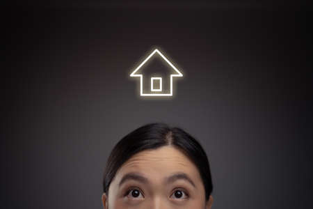 Happy Asian woman and cloud icon hologram effect. Isolated on background.の写真素材