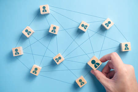 Wooden block with people icon teamwork business group. Connection networking business concepts.の写真素材