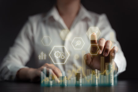 Concepts of economic technology future business Eco friendly new trading platform. Businessman with coin stack and hologram chart.の写真素材