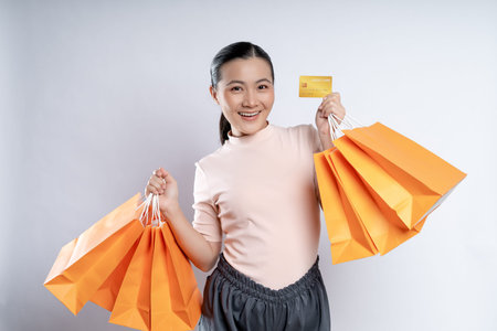 Asian woman was sick with body pain touching her body and standing isolated on white background.