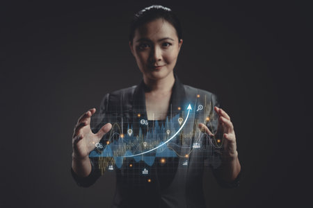 Asian woman voting and pressing angry face emoticon on virtual touch screen, isolated on background. Customer service satisfaction survey concept.の写真素材