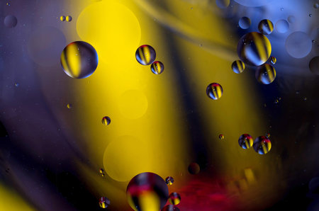 colored oil droplets in the water