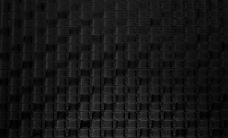 black carbon fiber texture useful as a background with copy space for text or imageの写真素材