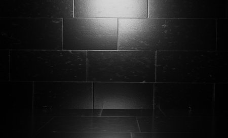 Black ceramic tile wall texture background. Black and white ceramic tile wallの写真素材