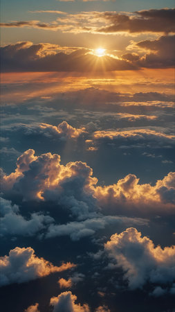 Sunset in the clouds. View from airplane window. Travel concept.の素材