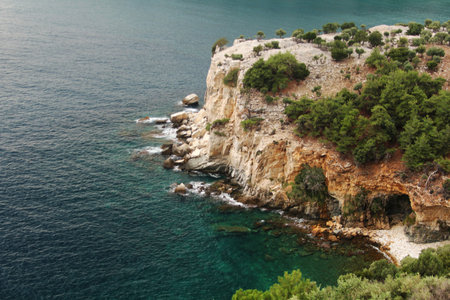 sea and pebbly beach photographed from aboveの写真素材