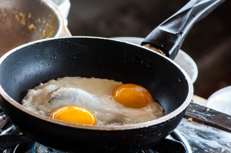 Fried eggs in a frying pan