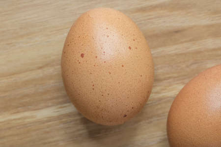 eggs cloves on wooden vintage background.の写真素材