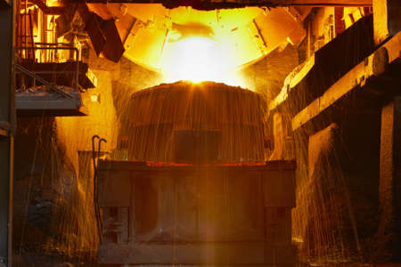 Molten hot steel is pouring - Industrial metallurgyのeditorial素材