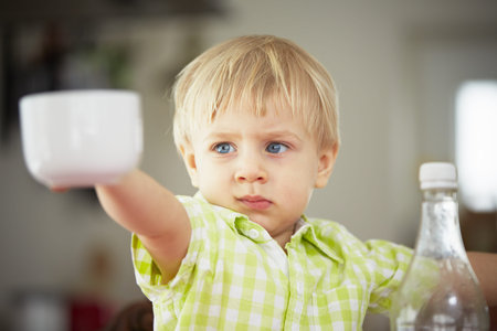 Little boy in the kitchen の写真素材