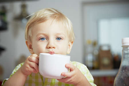 Little boy in the kitchen の写真素材