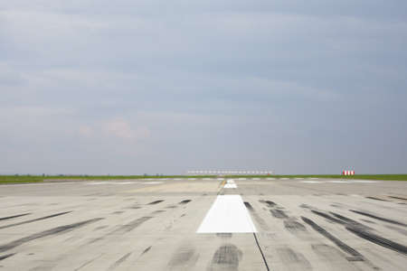 Skid marks on at the airport runway - selective focus の写真素材