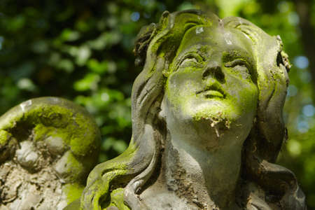 Statue of an angel on old cemetery の写真素材