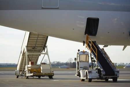 Airplane parked at the airportの写真素材