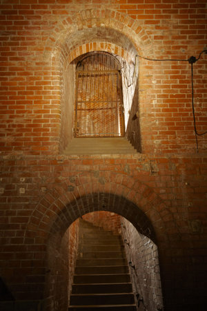Stairs and underground corridor in old industrial building.