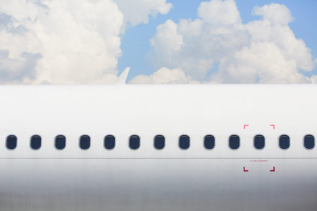 Windows of the white airplane - copy space