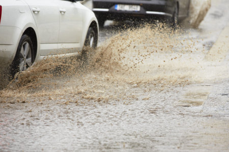 Traffic in the heavy rain - selective focusの写真素材