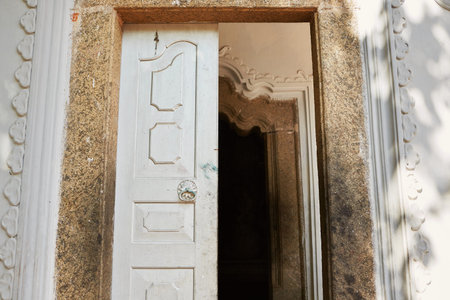Front view on the white ancient door.の写真素材
