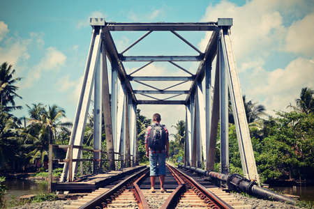 Young traveler in the railwayの写真素材
