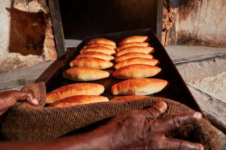 Traditional preparation of rolls in the bakery.の写真素材