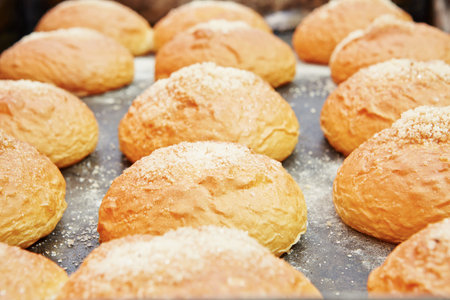 Freshly baked cakes in a traditional bakery.の写真素材