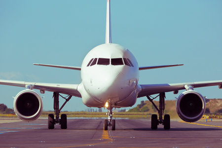 Airplane is taxiing to take off - retro colorsの写真素材