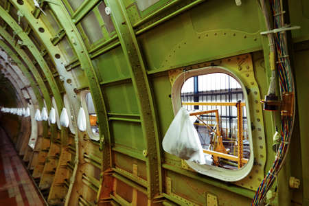 Window of the airplane under heavy maintenanceの写真素材