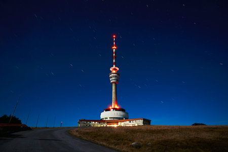 Amazing night view of the TV transmitter with lookout on the top mountain Praded. Famous place in Jeseniky mountains in the Czech Republic. の写真素材