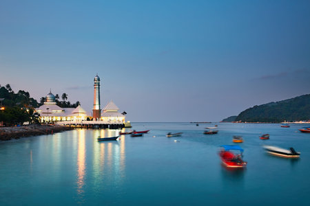 Perhentian islands during twilight. Illuminated mosque at island Kecil, Malaysiaの写真素材