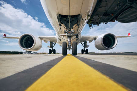 Front view of airplane at airport. Preparation passenger plane before flight.の写真素材