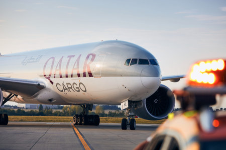 Prague, Czech Republic - August 13, 2020: Cargo airplane Boeing 777F of Qatar Airways taxiing at...