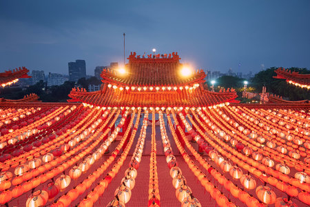 Traditional Chinese red lanterns in Thean Hou Temple against urban skyline. Kuala Lumpur, Malaysiaの写真素材