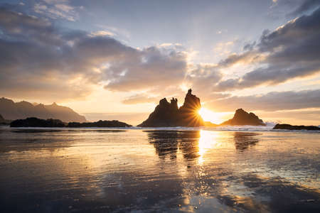 Scenic view of Benijo beach against sky at beautiful sunset. Tenerife, Canary Islands, Spain.の写真素材