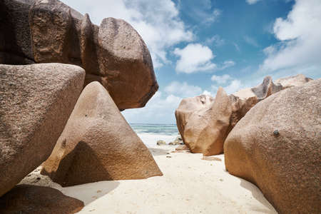 Scenics view at beautfiful sand beach with granite boulders in Seychellesの写真素材