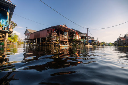 Kampong Phluk floating village with stilt houses on Tonle Sap lake in Cambodia.の写真素材