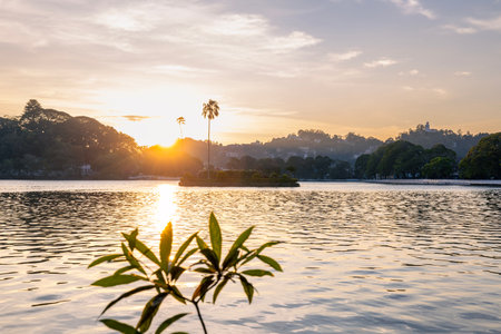 Lake in historic city Kandy at beautiful sunset in Sri Lanka.の写真素材
