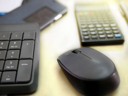 Close-up of laptop keyboard with focus on mouseの写真素材