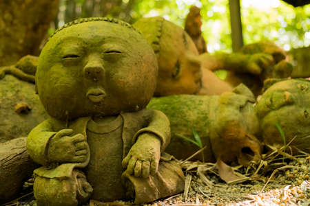 Clay dolls decorate the garden to look lovely and beautiful.