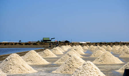 The salt stack in the original salt farm is produced from natural seawater for the final process before being shipped to the consumer.の写真素材