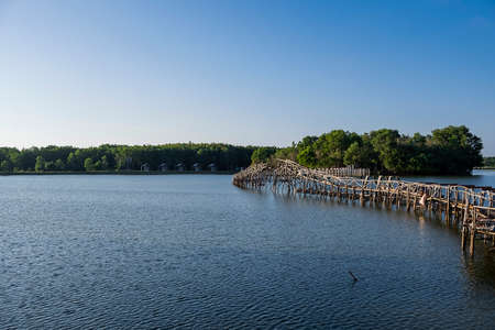 Wooden bridge is under construction. Used to walk in the lake.の写真素材