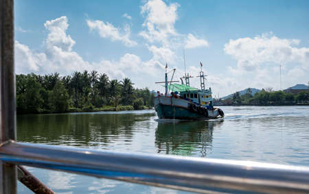 Fishing boat Back from fishing from the sea. In clear weather