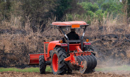 Agricultural plows are plowed to wait for the farming season.の写真素材