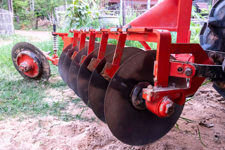 Agricultural plows are plowed to wait for the farming season.の写真素材