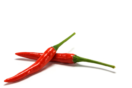 Red chili pepper isolated on a white backgroundの写真素材