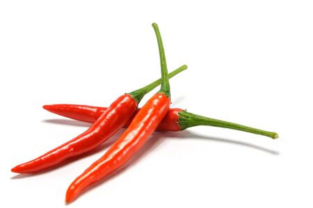 Red chili pepper isolated on a white backgroundの写真素材