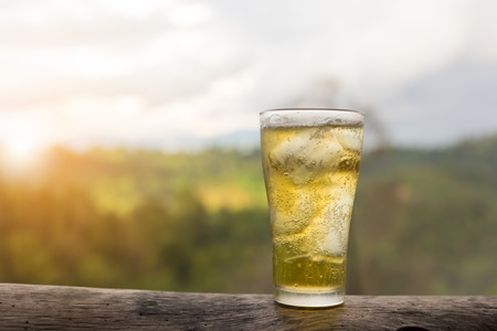 Beer on woodの写真素材