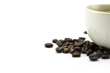 Coffee cup and beans on a white background.