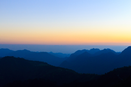 Sun rise with blue and orange sky in the morningの写真素材
