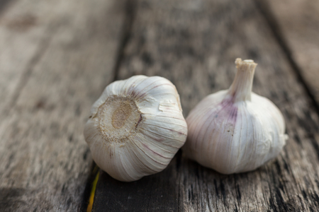 garlic on woodの写真素材